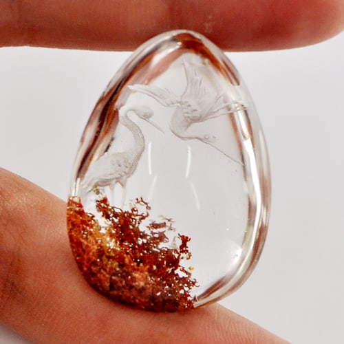 Natural Moss Quartz 75.00 Ct. Carving Birds Inner Pear Cabochon Shape 35 x 25 Mm. Gemstone from: Product ID: 805527011 Product Name: Natural Quartz Weight: 75.00 CT. Size: 35 x 25 x 15 MM. Shape: Pear Cabochon Color: White Clarity:Semi - Transparent Luster: Good Gems Origin: Thailand Treatment: U
