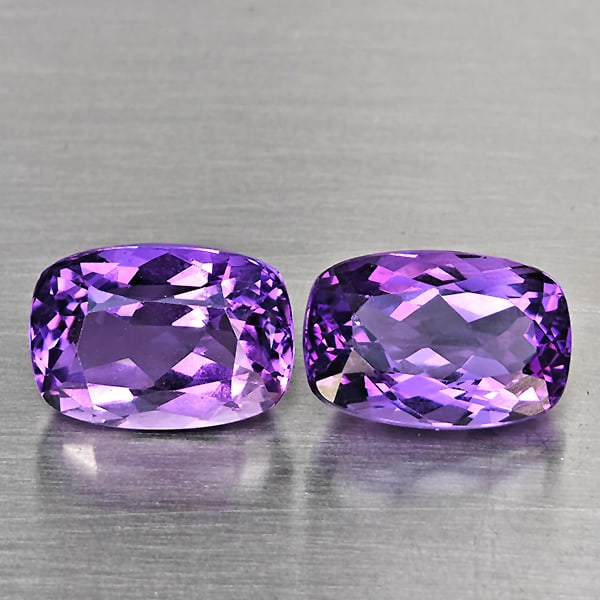 Natural Purple Amethyst 7.42 Ct. 2 Pcs. VVS Cushion Shape 11.4 x 7.6 Mm. Gemstone From Brazil: Product ID: 800325692 Product Name: Natural Amethyst Weight: 7.42 CT. Size: 11.4 x 7.6 x 6.5 MM. Shape: Cushion Shape Color: Purple Clarity:VVS Luster: Very Good Gems Origin: Brazil Treatment: Unheate