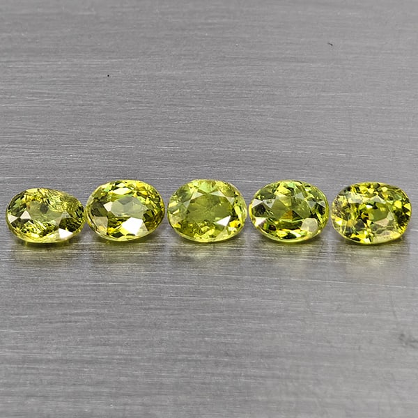 Natural Green Demantiod Garnet 1.17 Ct. 5 Pcs Oval Shape 4.2 x 3 Mm Gemstones From Madagascar: Product ID: 802937527 Product Name: Natural Demantoid Weight: 1.17 CT. Size: 4.2 x 3 x 2 MM. Shape: Oval Color: Green Clarity:SI1 Luster: Good Gems Origin: Madagascar Treatment: Unheated Crystal Struc
