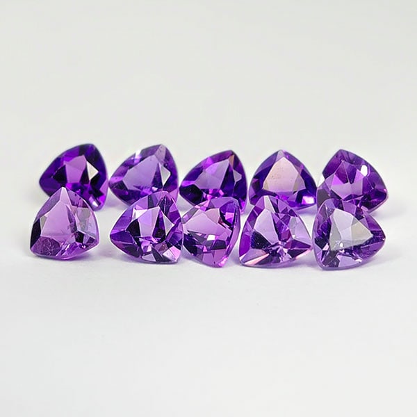 Natural Purple Amethyst 4.00 Ct. VVS Trilliant Shape 4.1 x 4.1 Mm. Unheated Gemstone from Brazil: Product ID: 800325261 Product Name: Natural Amethyst Weight: 4.00 CT. Size: 4.1 x 4.1 x 3.4 MM. Shape: Trilliant Color: Purple Clarity:VVS Luster: Good Gems Origin: Brazil Treatment: Unheated Crystal