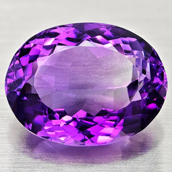 Natural Purple Amethyst 11.31 Ct. VVS Oval Shape 16.2 x 12.3 Mm. Gemstone from Brazil: Product ID: 800325479 Product Name: Natural Amethyst Weight: 11.31 CT. Size: 16.2 x 12.3 x 9 MM. Shape: Oval Color: Purple Clarity:VVS Luster: Good Gems Origin: Brazil Treatment: Unheated Crystal Stru