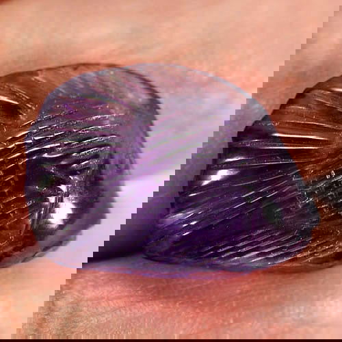 Natural Violet Amethyst 8.17 Ct Fish Carving Shape 18.4 x 12.7 Mm. Unheated Gemstone From Brazil: Product ID: 810302976 Product Name: Natural Amethyst Weight: 8.17 CT. Size: 18.4 x 12.7 x 6.4 MM. Shape: Fish Carving Color: Violet Clarity:Semi-Transparent Luster: Good Gems Origin: Brazil Treatment: