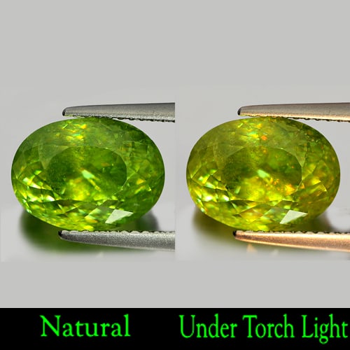 Natural Green Titanium With Rainbow Spark Sphene 6.34 Ct. Oval Shape 11.95 x 8.82 Mm.Unheated: Product ID: 806501842 Product Name: Natural Sphene Weight: 6.34 CT. Size: 11.95 x 8.82 x 7.75 MM. Shape: Oval Color: Green With Rainbow Spark Clarity:SI1 Luster: Adamantine Gems Origin: Madagascar Tre