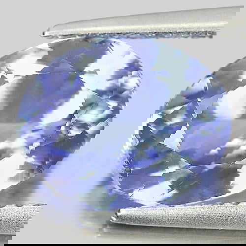 Certified Natural Violetish Blue Tanzanite 3.09 Ct. VVS Oval Shape 8.50 x 10.43 Mm. Gemstone From: Product ID: 807009387 Product Name: Natural Tanzanite Weight: 3.09 CT. Size: 8.50 x 10.43 x 4.74 MM. Shape: Oval Color: Blue Clarity:VVS Luster: Very Good Gems Origin: Tanzania Treatment: Heated Cryst