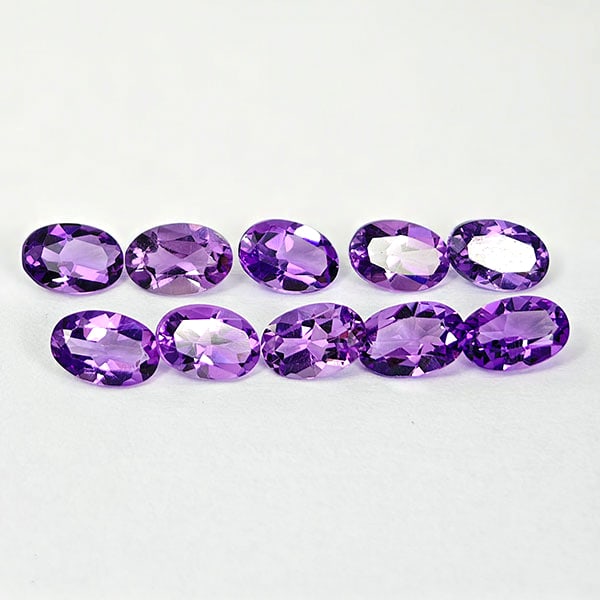 Natural Purple Amethyst 4.01 Ct. 10 Pcs. VVS Oval Shape 6.2 x 4.1 Mm. Gemstone from Brazil: Product ID: 800325264 Product Name: Natural Amethyst Weight: 4.01 CT. Size: 6.2 x 4.1 x 2.6 MM. Shape: Oval Color: Purple Clarity:VVS Luster: Good Gems Origin: Brazil Treatment: Unheated Crystal Struc