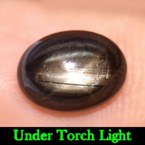 Natural Black Star Sapphire 3.96 Ct. Oval Cabochon Shape 10.3 x 7.8 Mm Gemstone from Thailand: Product ID: 806156519 Product Name: Natural Star Sapphire Weight: 3.96 CT. Size: 10.3 x 7.8 x 4.6 MM. Shape: Oval Cabochon Color: Black Clarity:Opaque Luster: Good 6 Rays Star Gems Origin: Thailand Tr