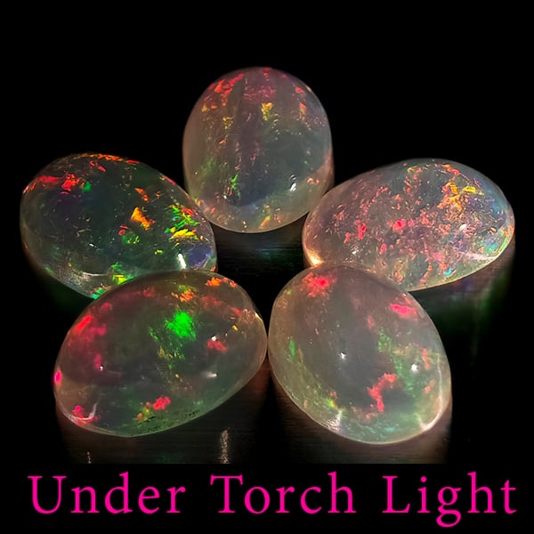 Natural Multi Color Opal 1.45 Ct. 5 Pcs. Oval Cabochon Shape 6.1 x 4.1 Mm. Unheated Gemstone: Product ID: 818728097 Product Name: Natural Opal Weight: 1.45 CT. Size: 6.1 x 4.1 x 3 MM. Shape: Oval Cabochon Color: Multi-Color Clarity:Semi - Transparent Luster: Good Gems Origin: Ethiopia Treatmen