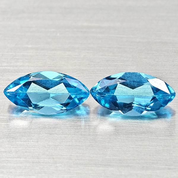 Natural Swiss Blue Topaz 2.71 Ct. 2 Pcs Marquise Shape 10 x 5.1 Mm Gemstones From Brazil: Product ID: 807168209 Product Name: Natural Blue Topaz Weight: 2.71 CT. Size: 10 x 5.1 x 3.5 MM. Shape: Marquise Shape Color: Swiss Blue Clarity:VSI Luster: Good Gems Origin: Brazil Treatment: Treated