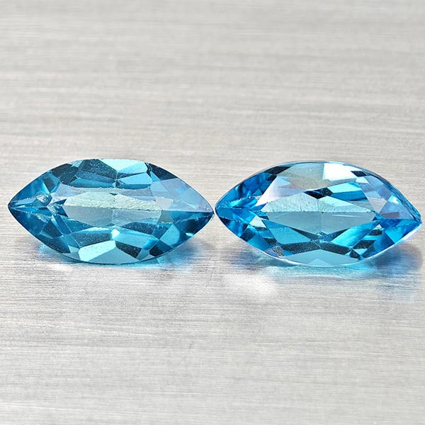 Natural Swiss Blue Topaz 2.78 Ct. 2 Pcs Marquise Shape 10 x 5.1 Mm Gemstones From Brazil: Product ID: 807168200 Product Name: Natural Blue Topaz Weight: 2.78 CT. Size: 10 x 5.1 x 4.2 MM. Shape: Marquise Shape Color: Swiss Blue Clarity:VSI Luster: Good Gems Origin: Brazil Treatment: Treated