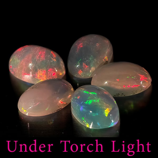 Natural Multi Color Opal 1.46 Ct. 5 Pcs. Oval Cabochon Shape 6 x 4.1 Mm. Unheated Gemstones: Product ID: 818728101 Product Name: Natural Opal Weight: 1.46 CT. Size: 6 x 4.1 x 2.6 MM. Shape: Oval Cabochon Color: Multi-Color Clarity:Semi - Transparent Luster: Good Gems Origin: Ethiopia Treatmen
