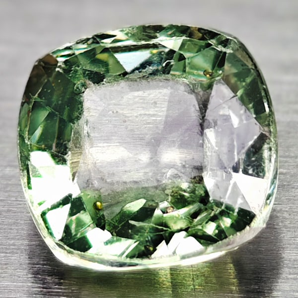 Natural Green Songea Sapphire 0.73 Ct. Cushion Shape 4.8 Mm Gemstone from Tanzania: Product ID: 106112897 Product Name: Natural Green Sapphire Weight: 0.73 CT. Size: 4.8 x 4.8 x 2.5 MM. Shape: Cushion Color: Green Clarity:IF Luster: Good Gems Origin: Tanzania Treatment: Warm Crystal