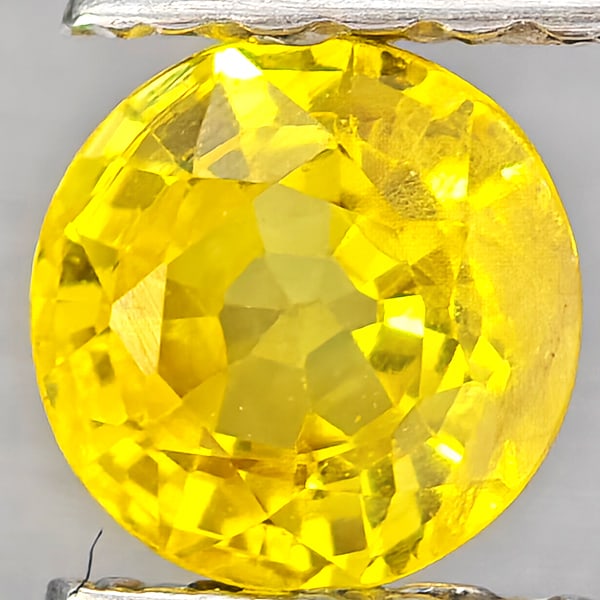 Natural Yellow Sapphire 0.59 Ct. Round Shape 4.8 Mm Gemstones From Thailand: Product ID: 806162936 Product Name: Natural Yellow Sapphire Weight: 0.59 CT. Size: 4.8 x 4.8 x 3 MM. Shape: Round Shape Color: Yellow Clarity:VSI Luster: Good Gems Origin: Thailand Treatment: Heated C