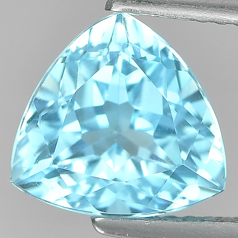 Natural Blue Topaz 3.68 Ct. Trilliant Shape 9.4 x 9.1 Mm. Gemstone From Brazil: Product ID: 807165470 Product Name: Natural Blue Topaz Weight: 3.68 CT. Size: 9.4 x 9.1 x 6 .2 MM. Shape: Trilliant Color: Blue Clarity:VSI Luster: Good Gems Origin: Brazil Treatment: Treated Crystal