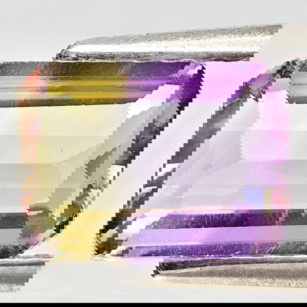 Natural Bi Color Ametrine 1.41 Ct. Octagon Shape 8.1 x 6 Mm Gemstone From Bolivia: Product ID: 800408402 Product Name: Natural Ametrine Weight: 1.41 CT. Size: 8.1 x 6 x 3.7 MM. Shape: Octagon Color: Bi Color Clarity:VSI Luster: Good Gems Origin: Bolivia Treatment: Unheated Crystal S