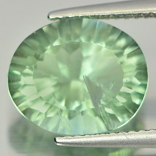 Natural Green Fluorite 5.56 Ct. Oval Concave Cut 12.1 x 10.2 Mm Gemstone from Brazil: Product ID: 802705298 Product Name: Natural Fluorite Weight: 5.56 CT. Size: 12.1 x 10.2 x 6.9 MM. Shape: Oval Concave Cut Color: Green Clarity:SI Luster: Good Gems Origin: Brazil Treatment: Unheated C