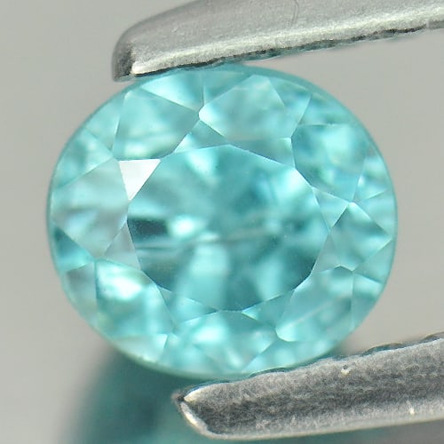 Natural Blue Zircon 1.04 Ct. Oval Shape 5.1 x 4.5 Mm. Gemstone From Cambodia: Product ID: 807721451 Product Name: Natural Zircon Weight: 1.04 CT. Size: 5.1 x 4.5 x 4.3 MM. Shape: Oval Color: Blue Clarity:VSI Luster: Good Gems Origin: Cambodia Treatment: Heated Crystal Structure