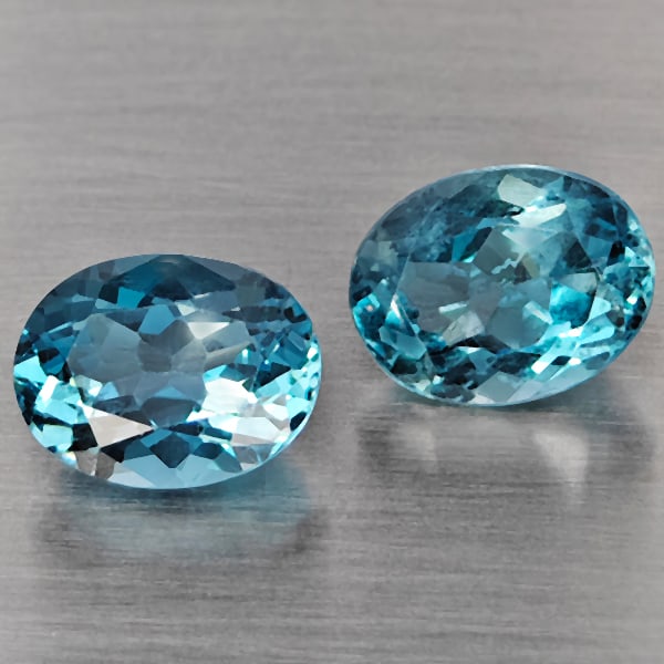 Natural London Blue Topaz 4.68 Ct. 2 Pcs. Oval Shape 9 x 7.1 Mm Gemstones From Brazil: Product ID: 807168898 Product Name: Natural Blue Topaz Weight: 4.68 CT. Size: 9 x 7.1 x 4.3 MM. Shape: Oval Color: London Blue Clarity:VSI Luster: Good Gems Origin: Brazil Treatment: Treated Crystal S