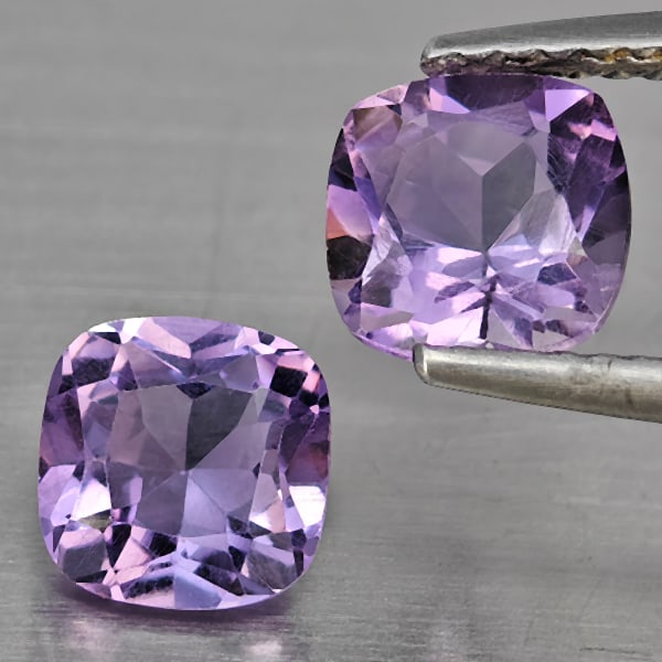 Natural Purple Amethyst 1.89 Ct. 2 Pcs. Cushion Shape 6.2 Mm. Unheated Gemstone From Brazil: Product ID: 800325575 Product Name: Natural Amethyst Weight: 1.89 CT. Size: 6.2 x 6.2 x 4.1 MM. Shape: Cushion Shape Color: Purple Clarity:800325575SI Luster: Good Gems Origin: Brazil Treatment: Unhea