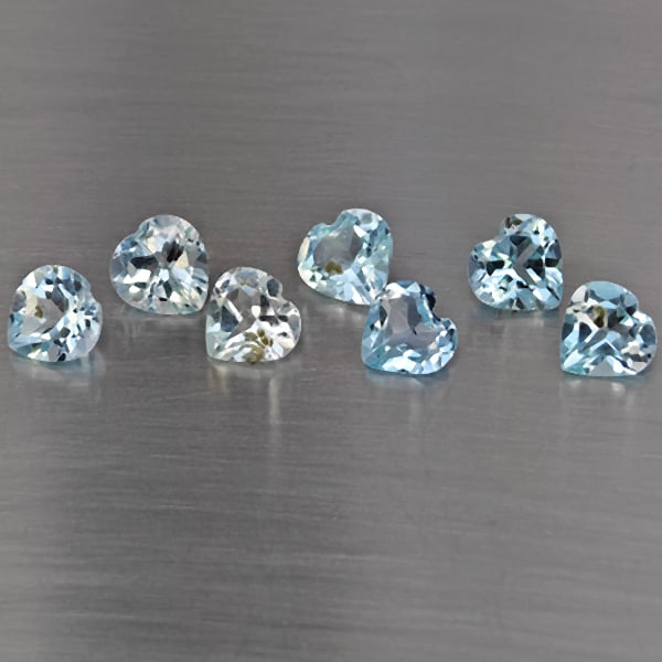 Natural Baby Blue Topaz 6.01 Ct. 7 Pcs Heart Shape 6.2 Mm Gemstone from Brazil: Product ID: 807168971 Product Name: Natural Blue Topaz Weight: 6.01 CT. Size: 6.2 x 6.2 x 4.2 MM. Shape: Heart Shape Color: Baby Blue Clarity:SI1 Luster: Good Gems Origin: Brazil Treatment: Treated Cr