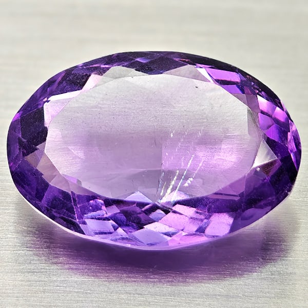 Natural Purple Amethyst 6.98 Ct. Oval Shape 15.8 x 11.1 Mm Gemstone from Brazil: Product ID: 800325487 Product Name: Natural Amethyst Weight: 6.98 CT. Size: 15.8 x 11.1 x 6.1 MM. Shape: Oval Color: Purple Clarity:VSI Luster: Good Gems Origin: Brazil Treatment: Unheated Crystal Str