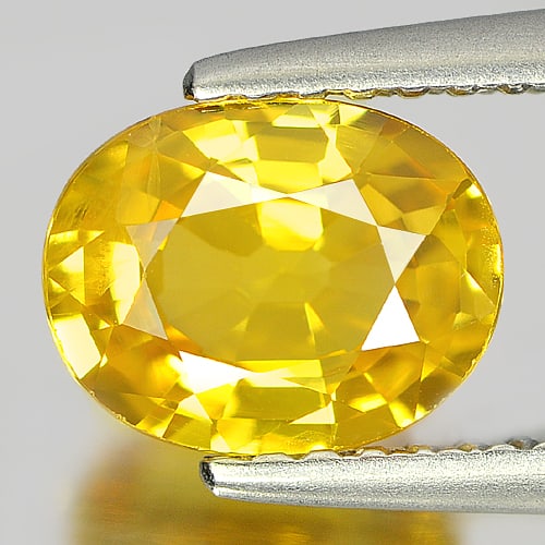 Natural Yellow Sapphire 1.42 Ct. Oval Shape 7.7 x 6 Mm Gemstone From Thailand: Product ID: 806151557 Product Name: Natural Yellow Sapphire Weight: 1.42 CT. Size: 7.7 x 6 x 3.6 MM. Shape: Oval Color: Yellow Clarity:VSI Luster: Very Good Gems Origin: Thailand Treatment: Heated Cry