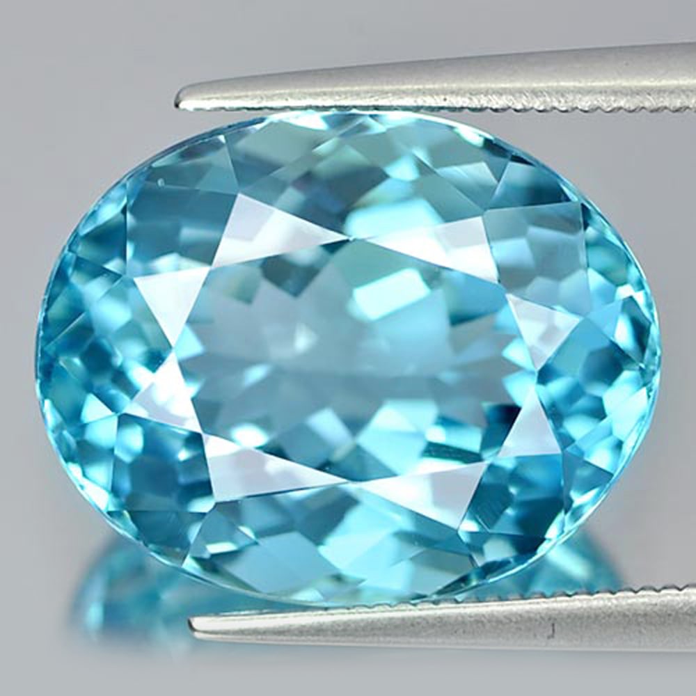 Natural Swiss Blue Topaz 17.37 Ct. Oval Shape 17.1 x 13.6 Mm. Gemstone From Brazil: Product ID: 807164972 Product Name: Natural Blue Topaz Weight: 17.37 CT. Size: 17.1 x 13.6 x 9.7 MM. Shape: Oval Color: Blue Clarity:IF Luster: Very Good Gems Origin: Brazil Treatment: Treated Crystal