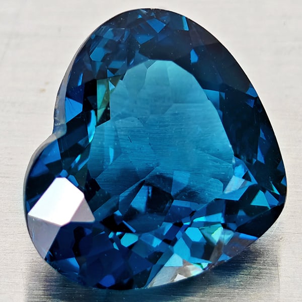 Natural London Blue Topaz 4.09 Ct. VVS Heart Shape 10.5 x 9.2 Mm. Gemstone From Brazil: Product ID: 807168363 Product Name: Natural Blue Topaz Weight: 4.09 CT. Size: 10.5 x 9.2 x 5.5 MM. Shape: Heart Shape Color: London Blue Clarity:VVS Luster: Good Gems Origin: Brazil Treatment: Treated