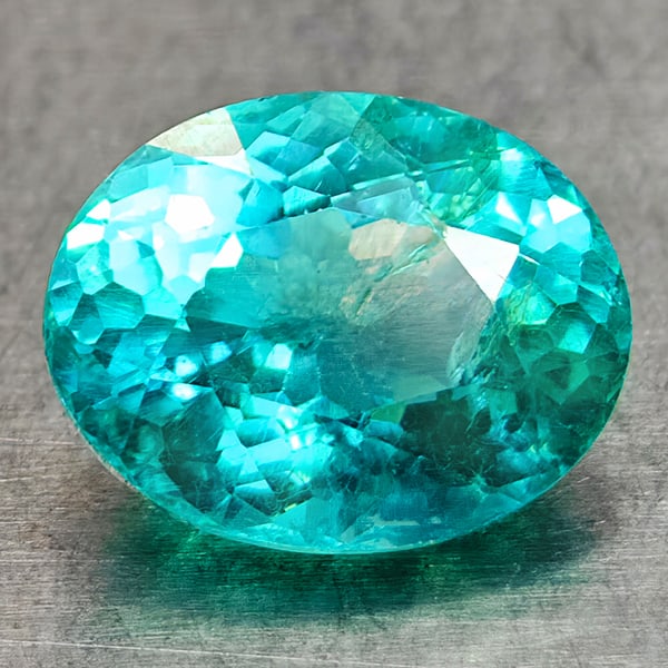 Natural Paraiba Color Apatite 1.11 Ct. Oval Shape 7.2 x 5.6 Mm Gemstone From Tanzania: Product ID: 800613585 Product Name: Natural Apatite Weight: 1.11 CT. Size: 7.2 x 5.6 x 3.9 MM. Shape: Oval Color: Neon Blue Clarity:VSI Luster: Very Good Gems Origin: Tanzania Treatment: Unheated Crys
