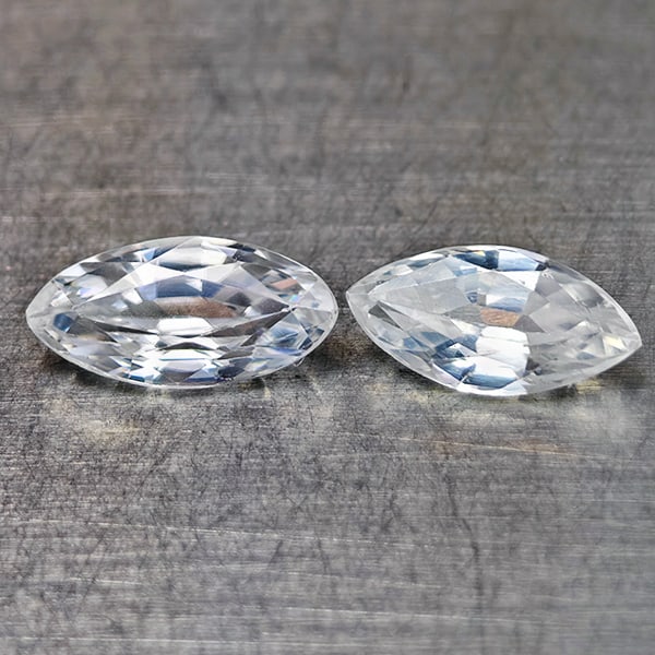 Natural White Zircon 1.49 Ct. 2 Pcs Marquise Shape 8 x 4 Mm Gemstones From Cambodia: Product ID: 807742883 Product Name: Natural Zircon Weight: 1.49 CT. Size: 8 x 4 x 2.6 MM. Shape: Marquise Color: White Clarity:VSI Luster: Very Good Gems Origin: Cambodia Treatment: Heated Crystal Str