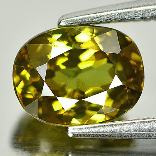 Natural Greenish Yellow Demantoid Garnet 1.99 Ct. Oval Shape 7.7 x 5.9 Mm Gemstone from Madagascar (1 of 3)