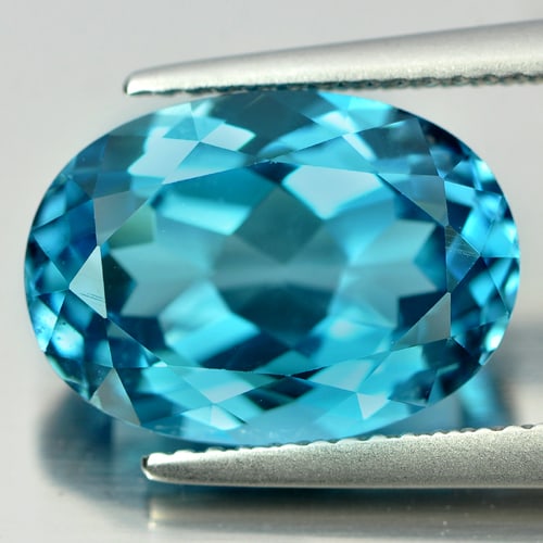 Natural London Blue Topaz 8.21 Ct. VVS Oval Shape 14.1 x 10.1 Mm Gemstone from Brazil: Product ID: 807165572 Product Name: Natural Blue Topaz Weight: 8.21 CT. Size: 14.1 x 10.1 x 6.9 MM. Shape: Oval Color: London Blue Clarity:VVS Luster: Very Good Gems Origin: Brazil Treatment: Treated