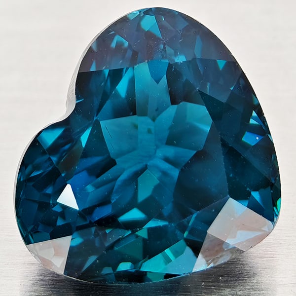 Natural London Blue Topaz 5.74 Ct. VVS Heart Shape 11.1 x 9.8 Mm. Gemstone From Brazil: Product ID: 807168378 Product Name: Natural Blue Topaz Weight: 5.74 CT. Size: 11.1 x 9.8 x 7.2 MM. Shape: Heart Shape Color: London Blue Clarity:VVS Luster: Good Gems Origin: Brazil Treatment: Treated