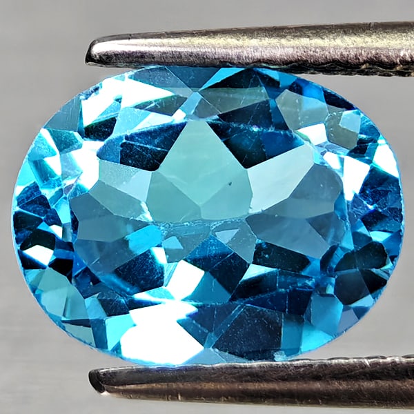 Natural Swiss Blue Topaz 2.11 Ct. Oval Shape 9.1 x 7.2 Mm Gemstone From Brazil: Product ID: 807168152 Product Name: Natural Blue Topaz Weight: 2.11 CT. Size: 9.1 x 7.2 x 4.2 MM. Shape: Oval Shape Color: Swiss Blue Clarity:VVS - VSI Luster: Good Gems Origin: Brazil Treatment: Trea