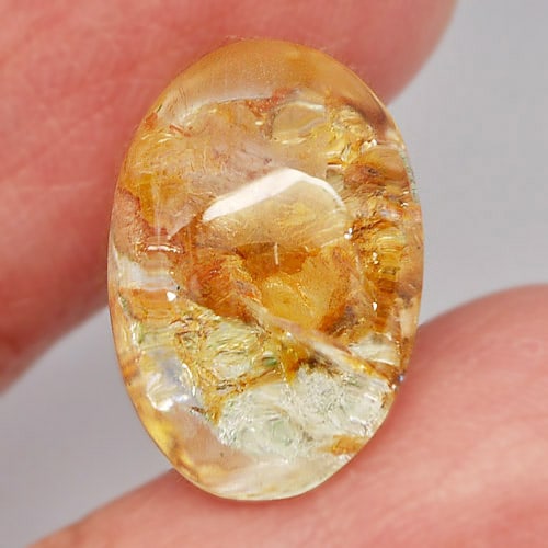 Natural White Brown Moss Quartz 10.12 Ct. Oval Cabochon Shape 17 x 12 Mm Gemstone From Thailand: Product ID: 805527189 Product Name: Natural Quartz Weight: 10.12 CT. Size: 17 x 12 x 7 MM. Shape: Oval Cabochon Color: White Clarity:Semi - Transparent Luster: Good Gems Origin: Thailand Treatment: Un