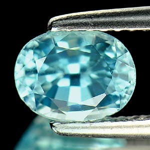 Natural Blue Zircon 1.95 Ct. Oval Shape 7.4 x 5.6 Mm Gemstone From Cambodia: Product ID: 807720525 Product Name: Natural Zircon Weight: 1.95 CT. Size: 7.4 x 5.6 x 4.6 MM. Shape: Oval Color: Blue Clarity:VSI Luster: Good Gems Origin: Cambodia Treatment: Heated Crystal Structure