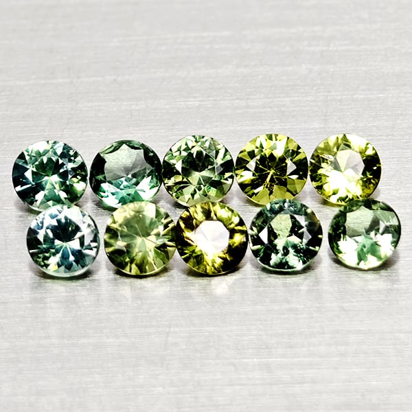 Natural Green Sapphire 1.10 Ct. 10 Pcs Round Diamond Cut 2.9 Mm. Gemstones From Thailand: Product ID: 806162498 Product Name: Natural Green Sapphire Weight: 1.10 CT. Size: 2.9 x 2.9 x 1.8 MM. Shape: Round Diamond Cut Color: Green Clarity:VSI Luster: Very Good Gems Origin: Thailand Treatmen