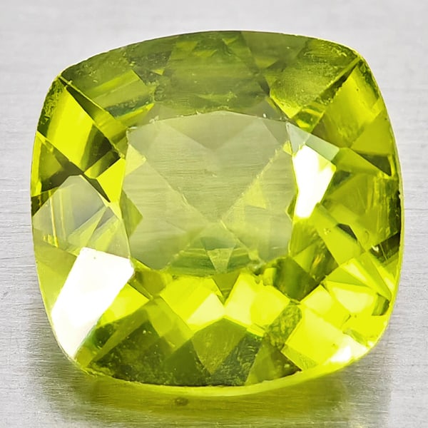 Natural Green Peridot 0.91 Ct. Cushion Shape 6.1 Mm Gemstones From Pakistan: Product ID: 805317350 Product Name: Natural Peridot Weight: 0.91 CT. Size: 6.1 x 6.1 x 3.3 MM. Shape: Cushion Shape Color: Green Clarity:VSI Luster: Good Gems Origin: Pakistan Treatment: Unheated Crys