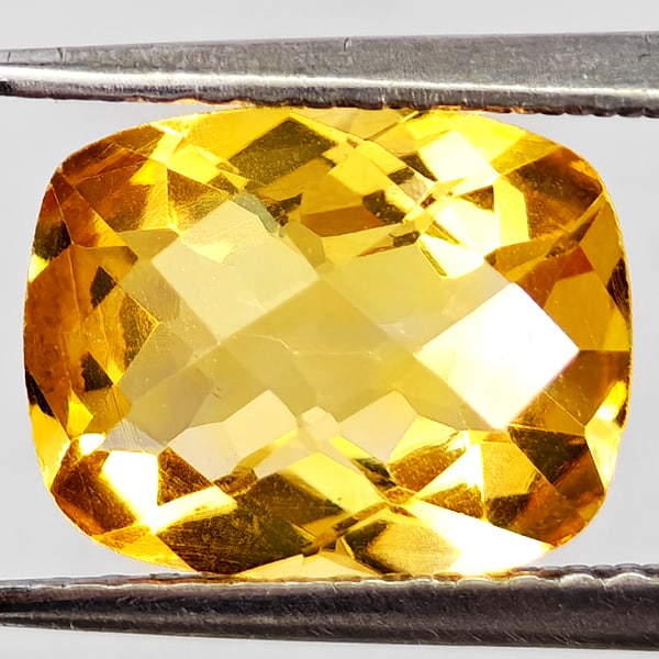 Natural Yellow Citrine 2.44 Ct. Cushion Checkerboard Cut 10.1 x 8 Mm. Gemstone From Brazil: Product ID: 801815194 Product Name: Natural Citrine Weight: 2.44 CT. Size: 10.1 x 8 x 5.2 MM. Shape: Cushion Checkerboard Cut Color: Yellow Clarity:VVS - VSI Luster: Good Gems Origin: Brazil Treatment