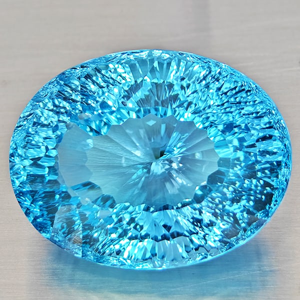 Natural Baby Blue Topaz 35.33 Ct. VVS Oval Concave Cut 21 x 16.6 Mm. Gemstone From Brazil (1 of 3)