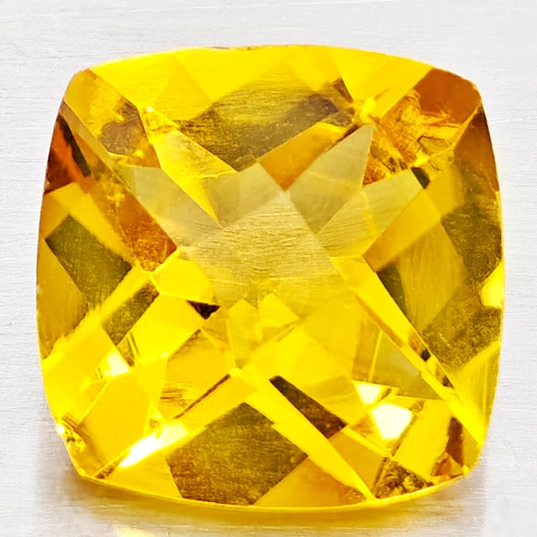 Natural Yellow Citrine 3.47 Ct. Cushion Checkerboard Cut 9.9 Mm. Gemstone from Brazil: Product ID: 801815145 Product Name: Natural Citrine Weight: 3.47 CT. Size: 9.9 x 9.9 x 6.3 MM. Shape: Cushion Checkerboard Cut Color: Yellow Clarity:VVS - VSI Luster: Good Gems Origin: Brazil Treatmen
