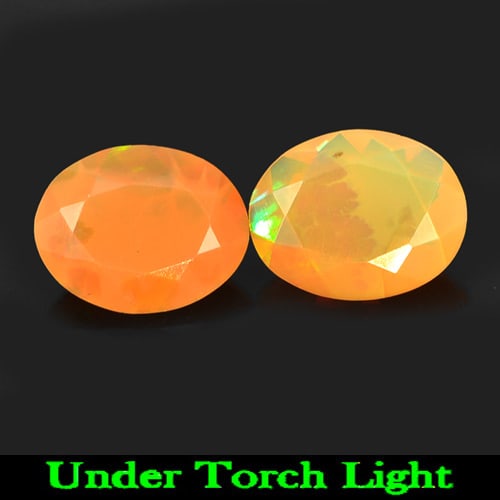 Natural Multi Color Play Of Colour Opal 1.85 Ct. 2 Pcs Oval Shape 9 x 7.2 Mm Gemstone From Ethiopia: Product ID: 818725042 Product Name: Natural Opal Weight: 1.85 CT. Size: 9 x 7.2 x 4 MM. Shape: Oval Color: Multi-Color Clarity:Semi - Transparent Luster: Iridescent Gems Origin: Ethiopia Treatment: Un