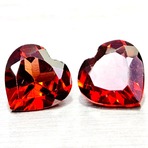 Natural Orangish Red Garnet 2.55 Ct. 2 Pcs Heart Shape 7 x 6.9 MM Gemstones From Tanzania: Product ID: 802936631 Product Name: Natural Red Garnet Weight: 2.55 CT. Size: 7 x 6.9 x 3.6 MM. Shape: Heart Shape Color: Orangish Red Clarity:VSI Luster: Good Gems Origin: Tanzania Treatment: Unheate