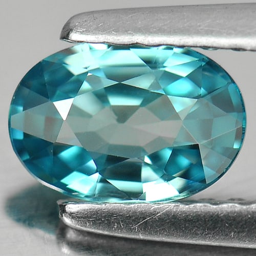 Natural Blue Zircon 0.97 Ct. Oval Shape 7 x 4.8 Mm. Gemstone From Cambodia: Product ID: 807724206 Product Name: Natural Zircon Weight: 0.97 CT. Size: 7 x 4.8 x 2.7 MM. Shape: Oval Color: Blue Clarity:VVS Luster: Good Gems Origin: Cambodia Treatment: Heated Crystal Structure: