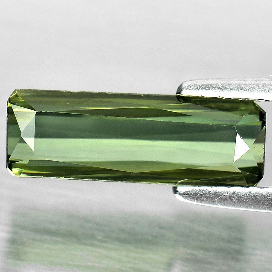 Natural Green Tourmaline 2.53 Ct. Octagon Shape 13.5 x 4.7 Mm. Gemstone from Nigeria: Product ID: 807237459 Product Name: Natural Tourmaline Weight: 2.53 CT. Size: 13.5 x 4.7 x 3.8 MM. Shape: Octagon Color: Green Clarity:VSI Luster: Good Gems Origin: Nigeria Treatment: Unheated Crystal