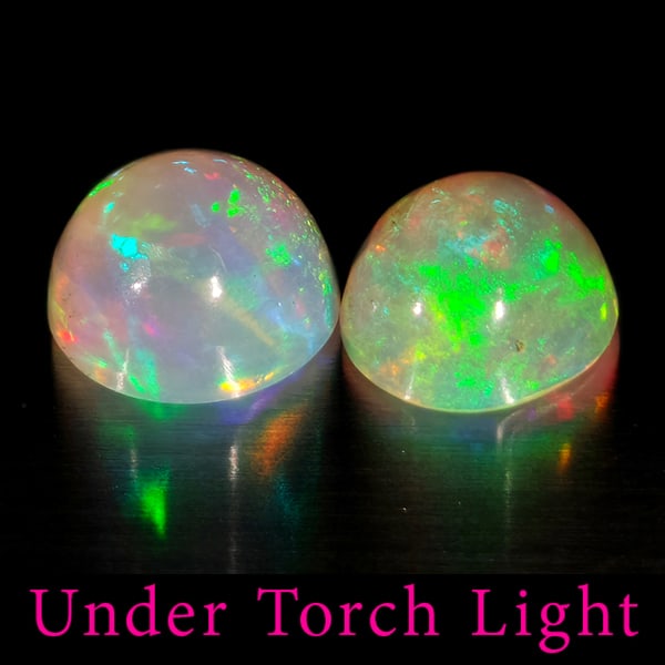 Natural Multi Color Opal 1.92 Ct. 2 Pcs Round Cabochon Shape 7.1 Mm Gemstones From Ethiopia: Product ID: 818728160 Product Name: Natural Opal Weight: 1.92 CT. Size: 7.1 x 7.1 x 4.6 MM. Shape: Round Color: Multi-Color Clarity:Semi - Transparent Luster: Good Gems Origin: Ethiopia Treatment: Unh