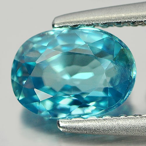 Natural Blue Zircon 1.46 Ct. Oval Shape Size 7.1 x 5.2 Mm. Gemstone From Cambodia: Product ID: 807721490 Product Name: Natural Zircon Weight: 1.46 CT. Size: 7.1 x 5.2 x 3.2 MM. Shape: Oval Color: Blue Clarity:VSI - SI Luster: Good Gems Origin: Cambodia Treatment: Heated Crystal Stru