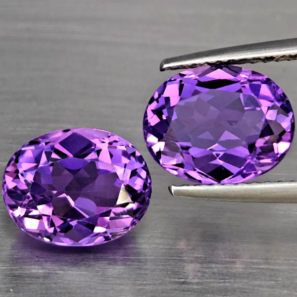 Natural Purple Amethyst 6.01 Ct. 2 Pcs. Clean Oval Shape 10.3 x 7.7 Mm. Unheated Gemstone From: Product ID: 800325630 Product Name: Natural Amethyst Weight: 6.01 CT. Size: 10.3 x 7.7 x 6.4 MM. Shape: Oval Color: Purple Clarity:IF Luster: Very Good Gems Origin: Brazil Treatment: Unheated Crystal