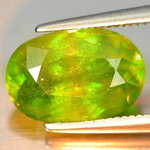 Natural Green Sphene Red Spark 3.56 Ct. Oval Shape 11.3 x 7.5 Mm. Gemstone From Madagascar (1 of 3)