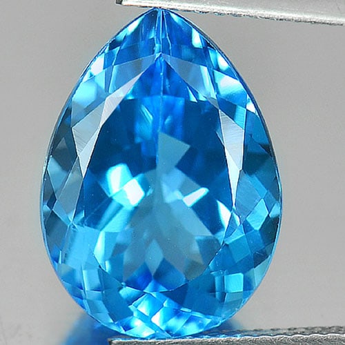 Natural Swiss Blue Topaz 10.80 Ct. Pear Shape 16.6 x 12 Mm. Gemstone from Brazil: Product ID: 807165859 Product Name: Natural Blue Topaz Weight: 10.80 CT. Size: 16.6 x 12 x 7.8 MM. Shape: Pear Color: Blue Clarity:IF Luster: Very Good Gems Origin: Brazil Treatment: Treated Crystal S