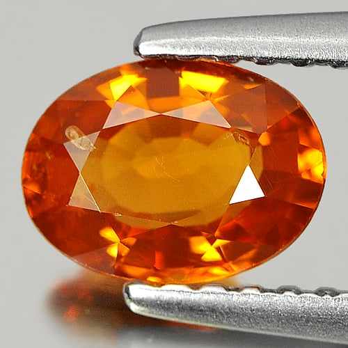Natural Reddish Orange Spessartine Garnet 0.83 Ct. Oval Shape 7 x 5 Mm Gemstone from Nigeria: Product ID: 802920986 Product Name: Natural Spessartine Weight: 0.83 CT. Size: 7 x 5 x 3 MM. Shape: Oval Color: Reddish Orange Clarity:SI Luster: Good Gems Origin: Nigeria Treatment: Unheated Crystal